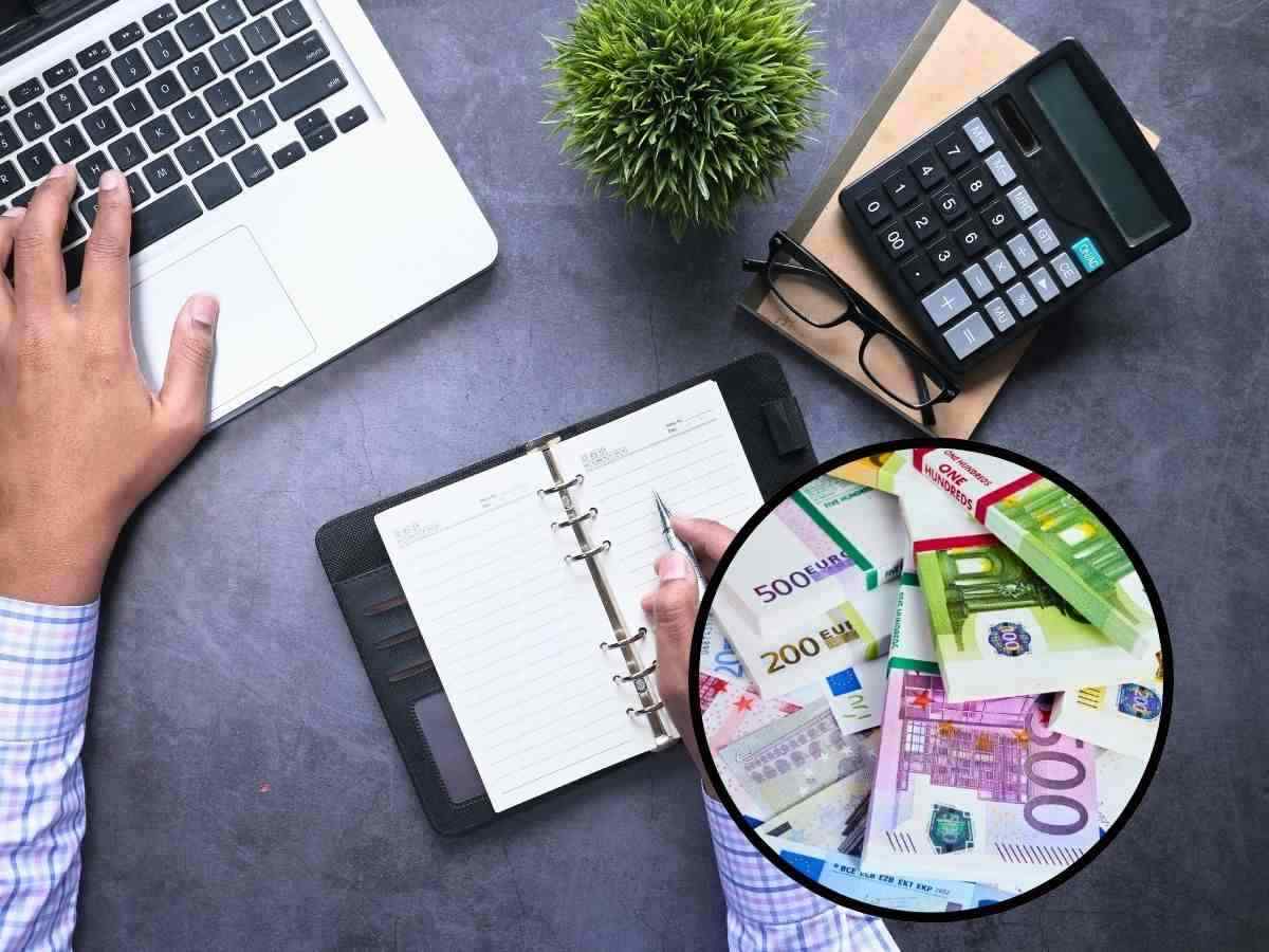 sfondo lavoratore alla scrivani e pc e tondo con banconote euro