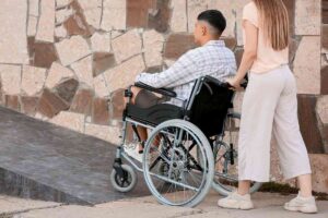 Assistente e disabile