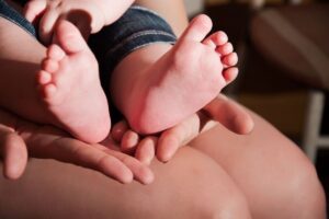 Mamma con neonato